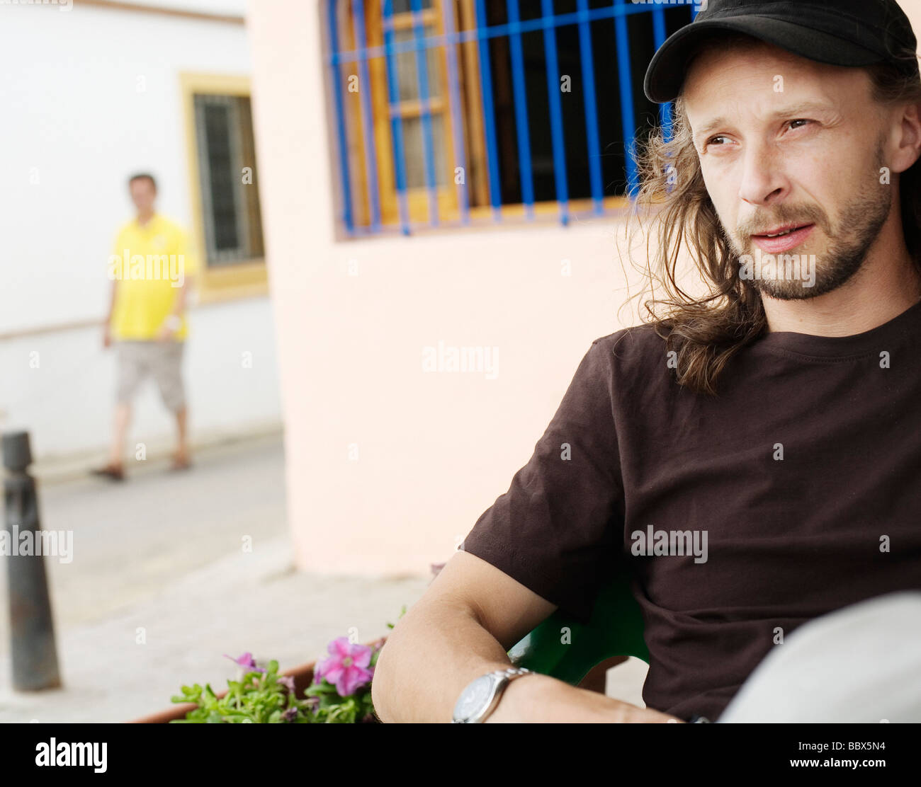 Bearded man in cap hi-res stock photography and images - Alamy
