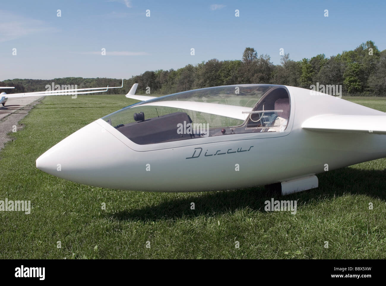sailplane or Glider at rest on an airfield Stock Photo