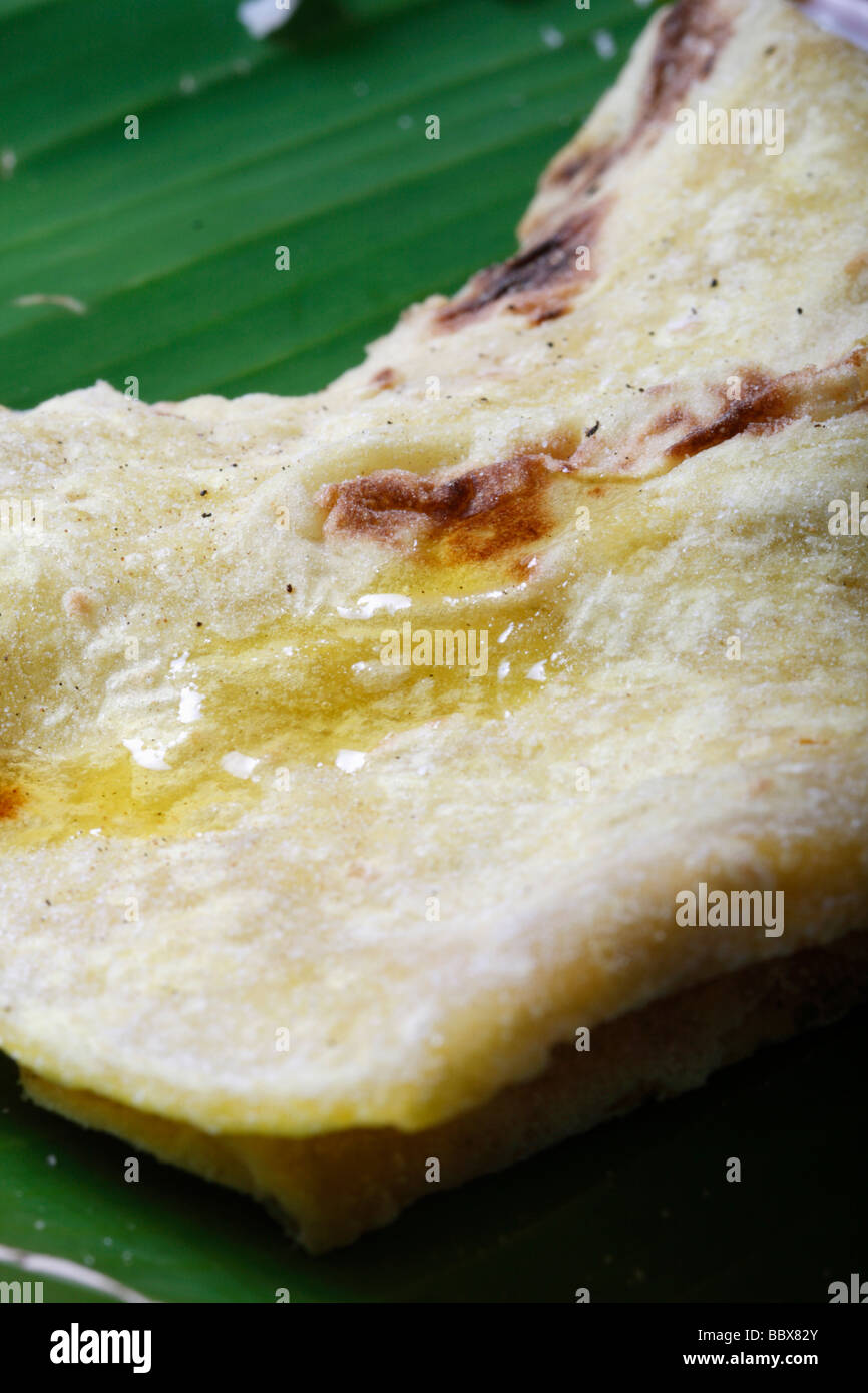 Obbattu A sweet pancake made with wheat flour and jaggery Stock Photo