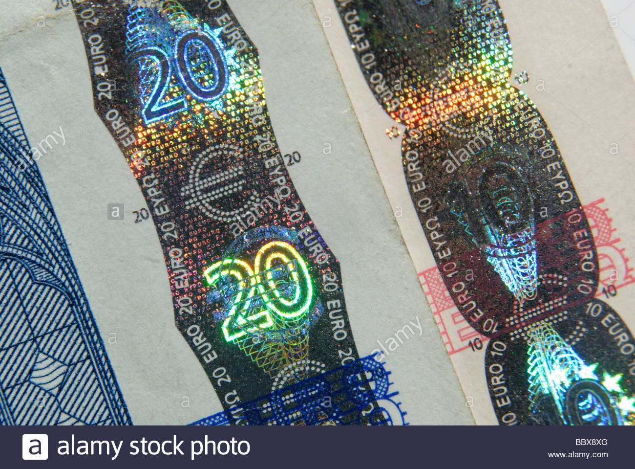 €20 and €10 Euro notes showing a holographic security strip Stock Photo