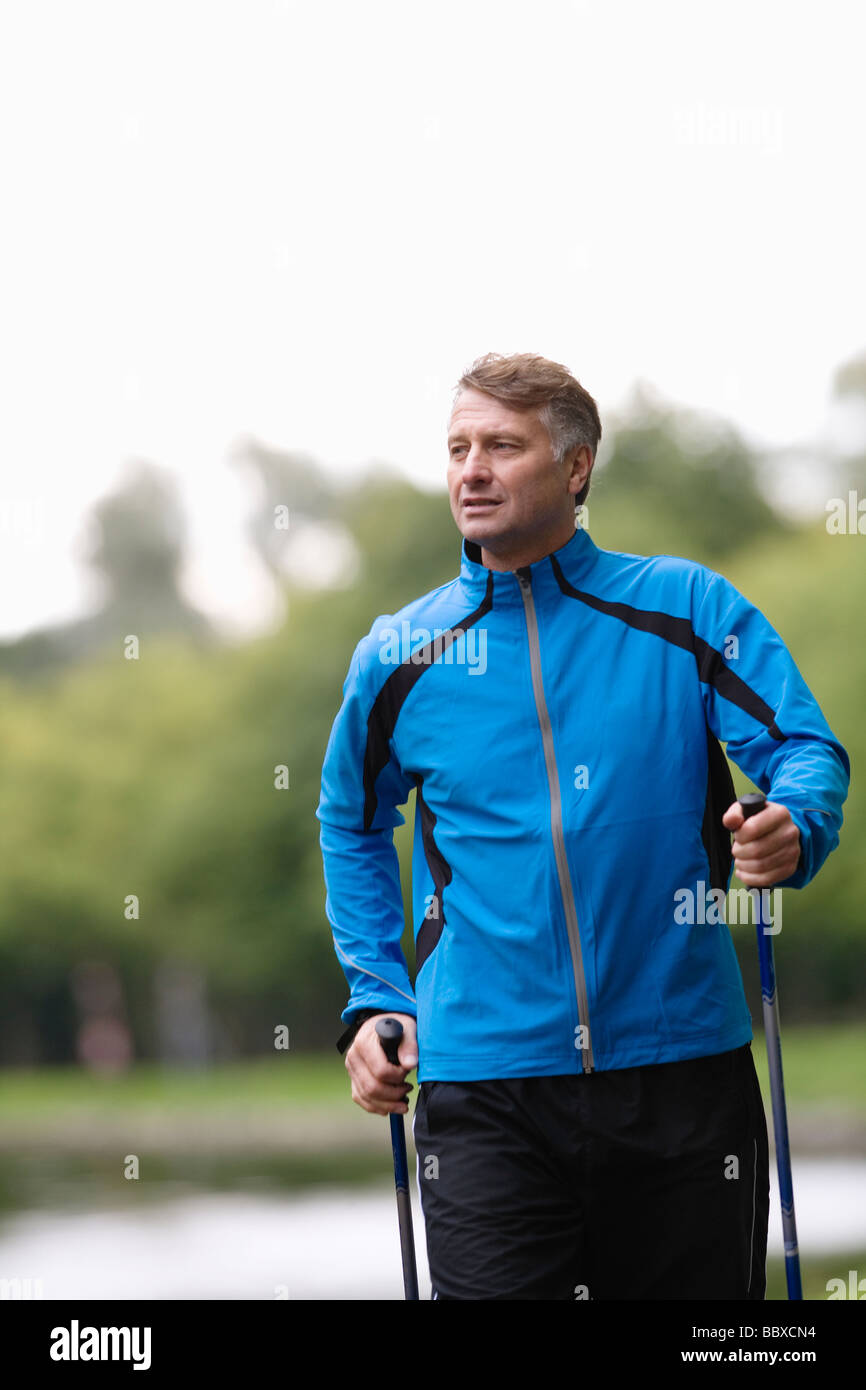 Walking with poles hi-res stock photography and images - Alamy