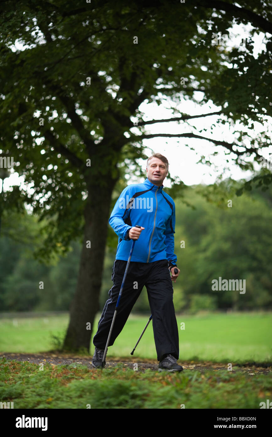 Walking with poles hi-res stock photography and images - Alamy