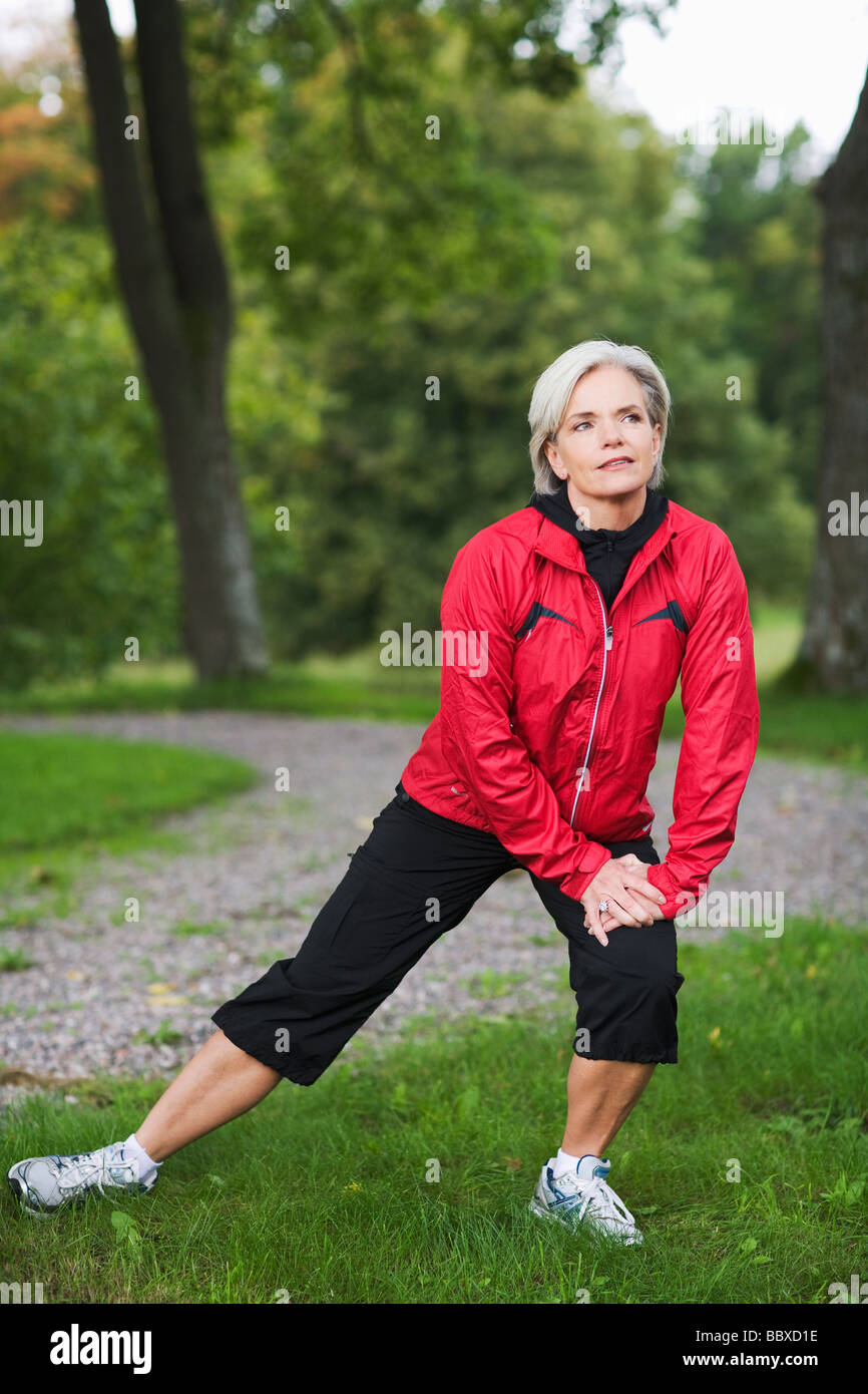 A woman doing stretching exercises Stockholm Sweden. Stock Photo