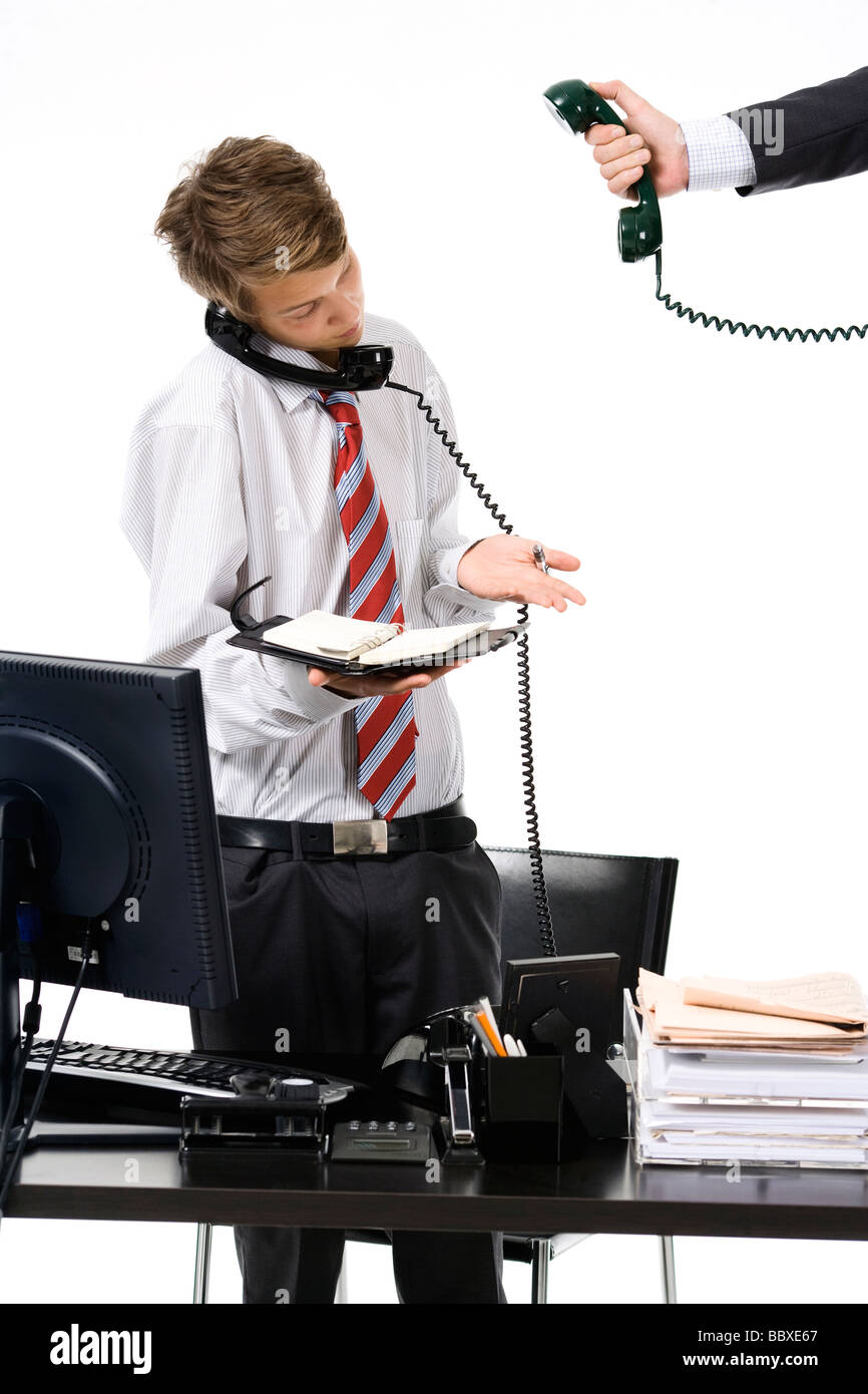 A teenage boy as a businessman at the office Stock Photo Alamy