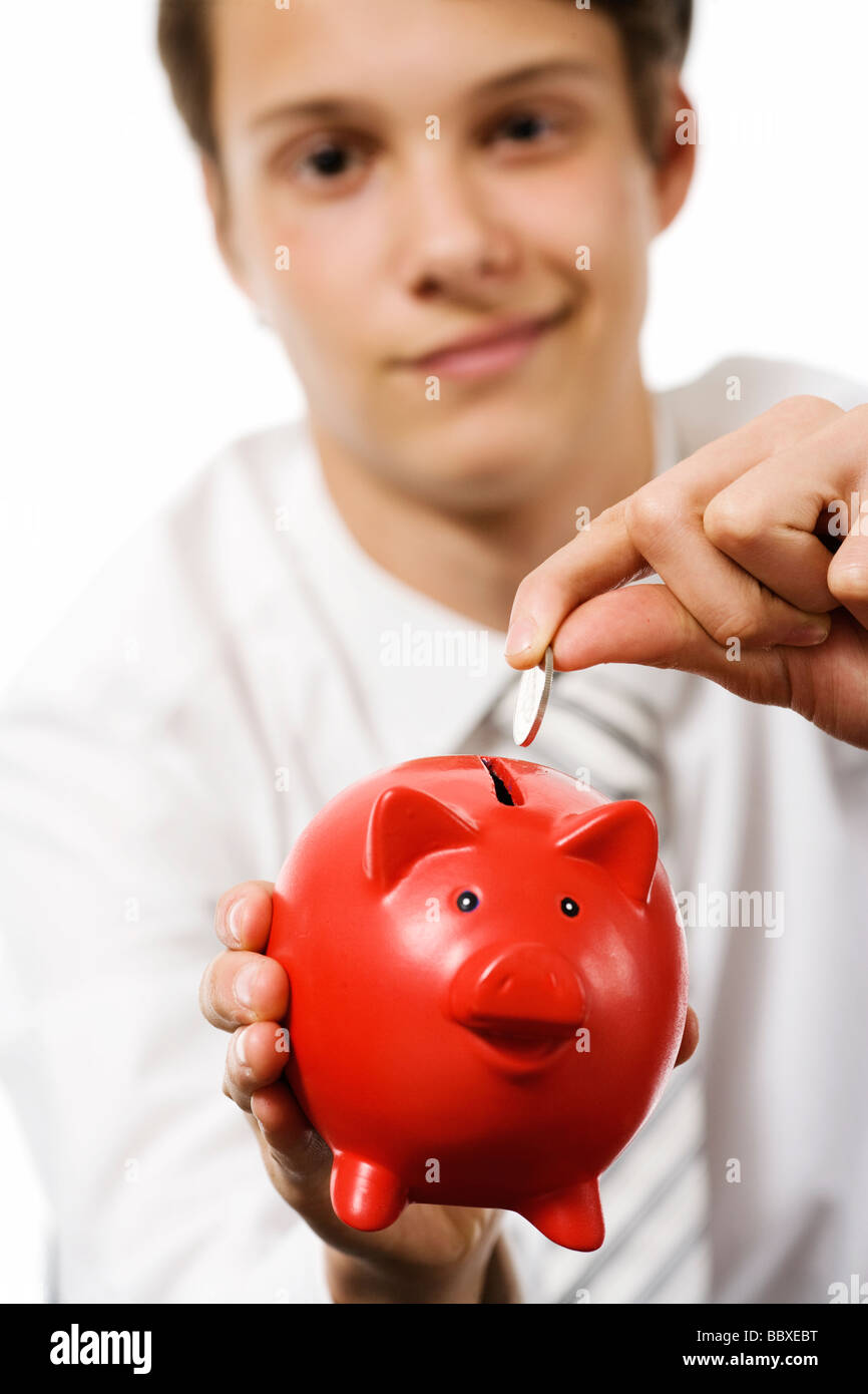 A boy with a piggy bank Stock Photo - Alamy