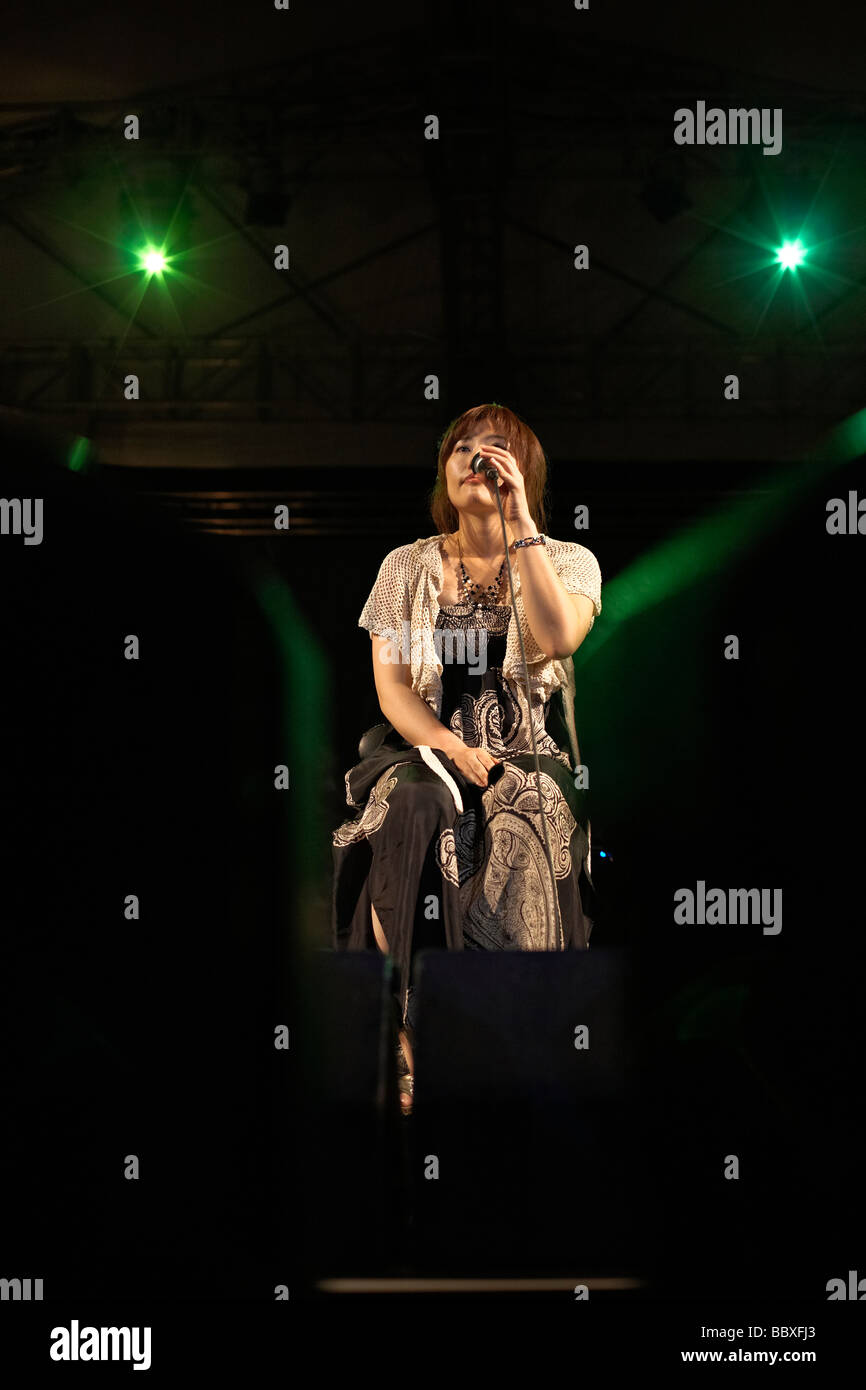 Female singer stage. Noon of the Japanese 'Bossa Nova Group'  performing on stage at the Hua Hin jazz festival 2009 Thailand S.E. Asia Stock Photo