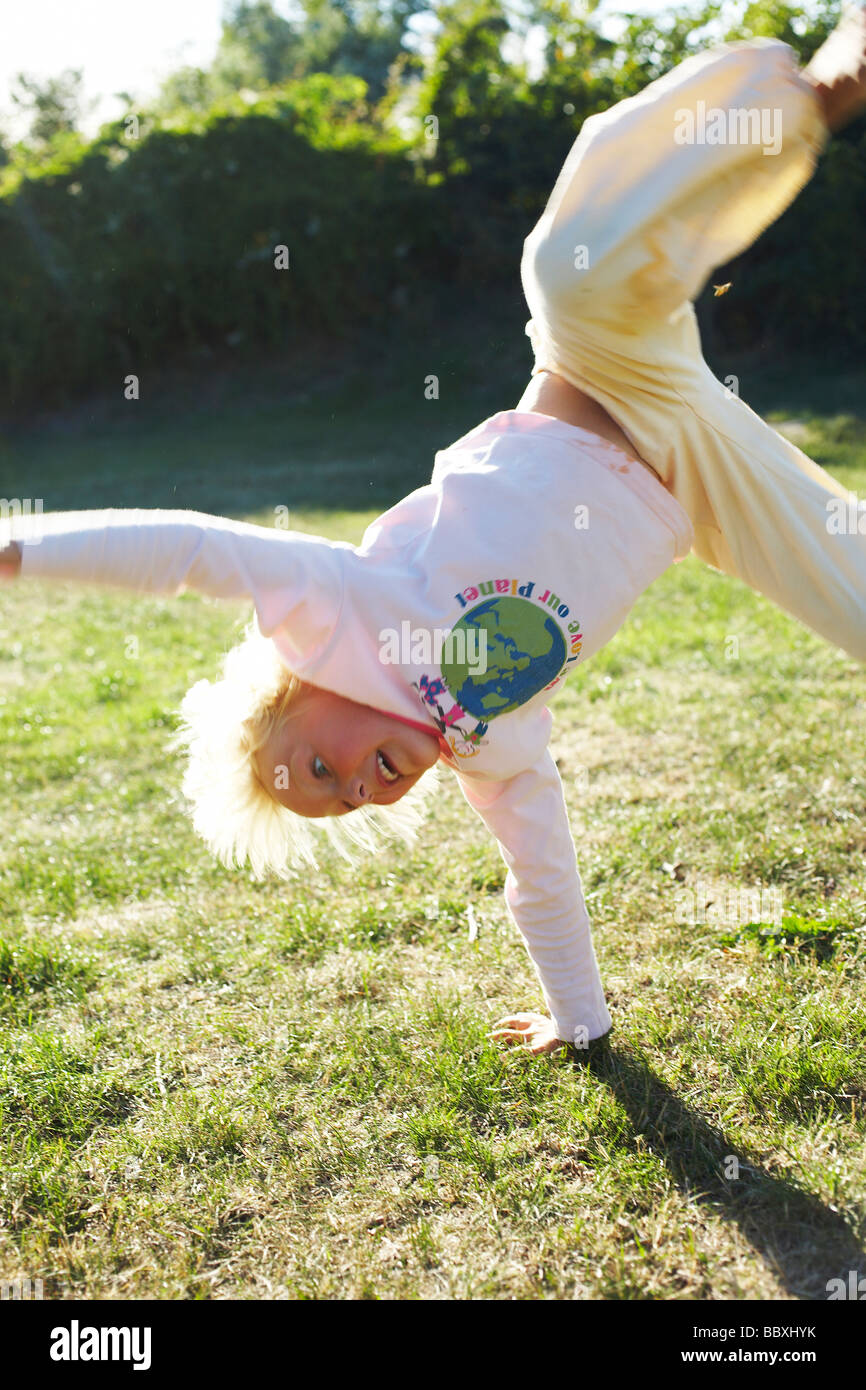 Girl cartwheeling hires stock photography and images Alamy