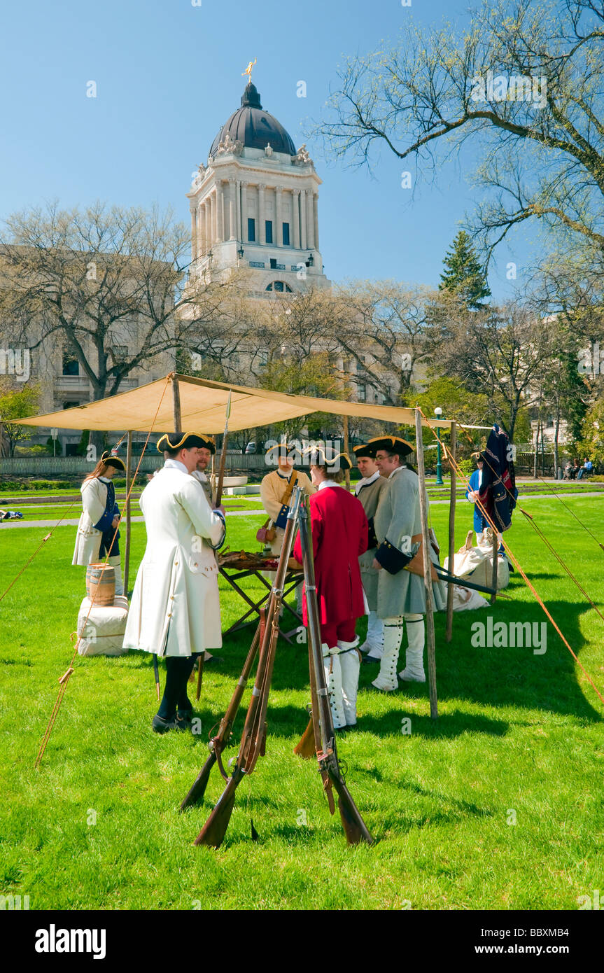 A Living History Association event with actors in period dress and the dome of the Manitoba Legislative building. Stock Photo