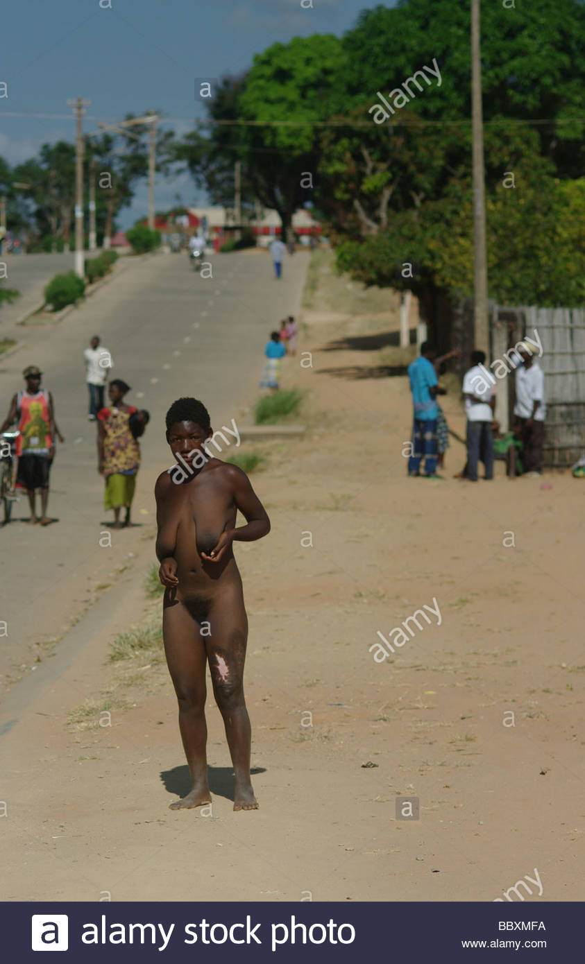 Woman Walking Through An African Village Without Clothes Holding One Of Her Breasts While Standing Street Mozambique Africa Woman Walking Through An African Village Without Clothes Holding One Of Her Breasts While Standing Street Mozambique Africa