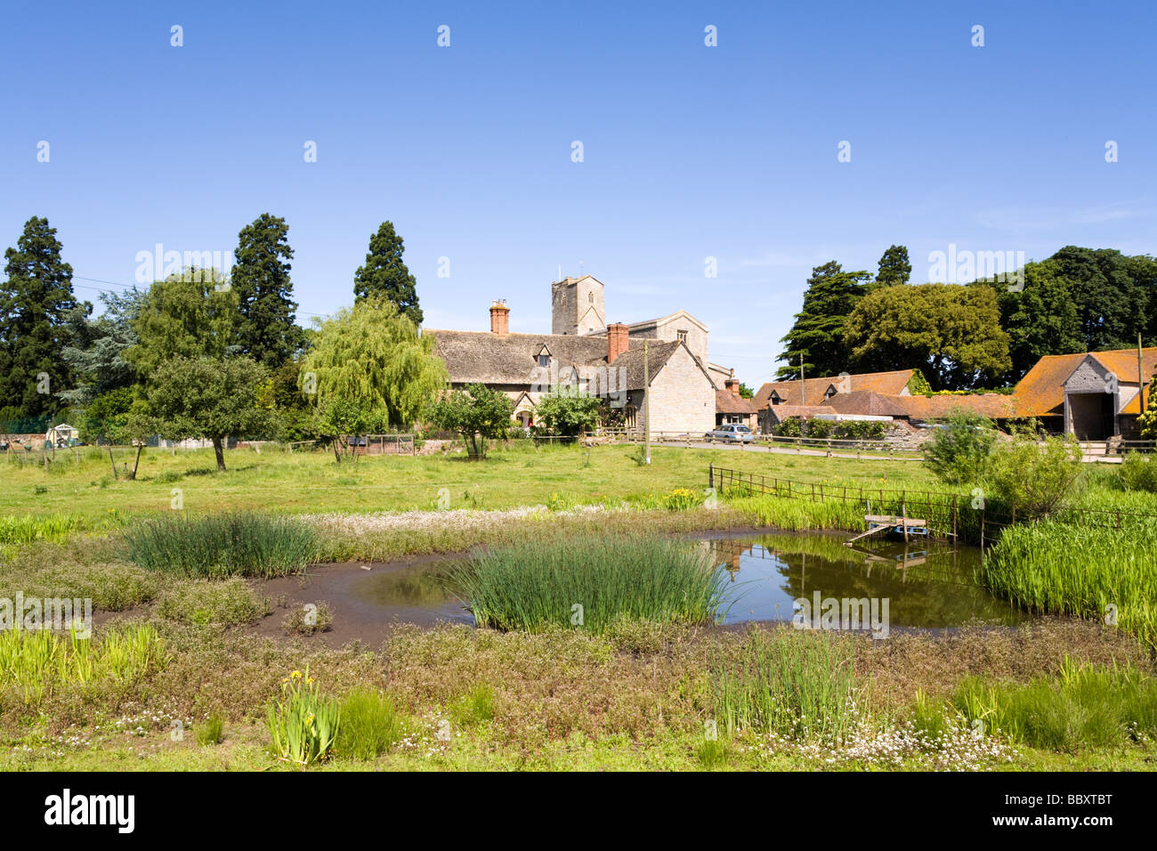 Priory Farm and the Priory Church of St Mary at Deerhurst, Gloucestershire UK Stock Photo