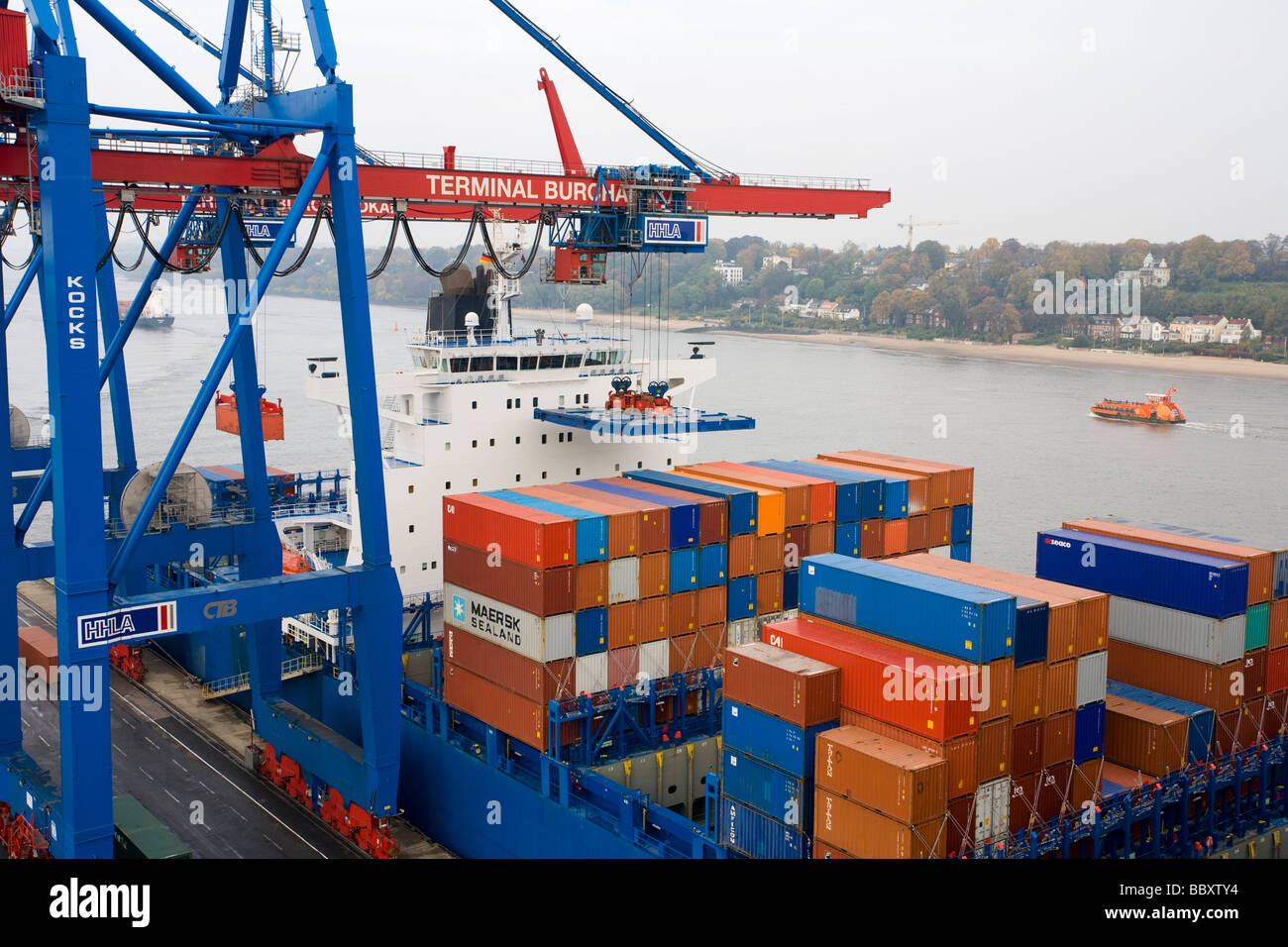 Container Onboard Containers onboard a docked containership await to be unloaded at ...