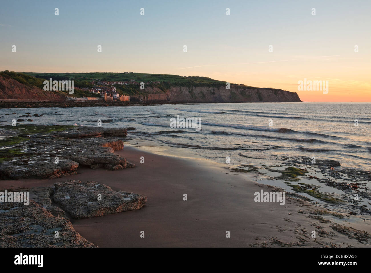 Sunrise at low tide Robin Hood's Bay, North Yorkshire, England, UK