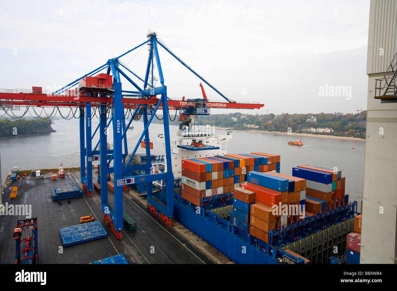 Container Onboard Containers onboard a docked containership await to be unloaded at ...