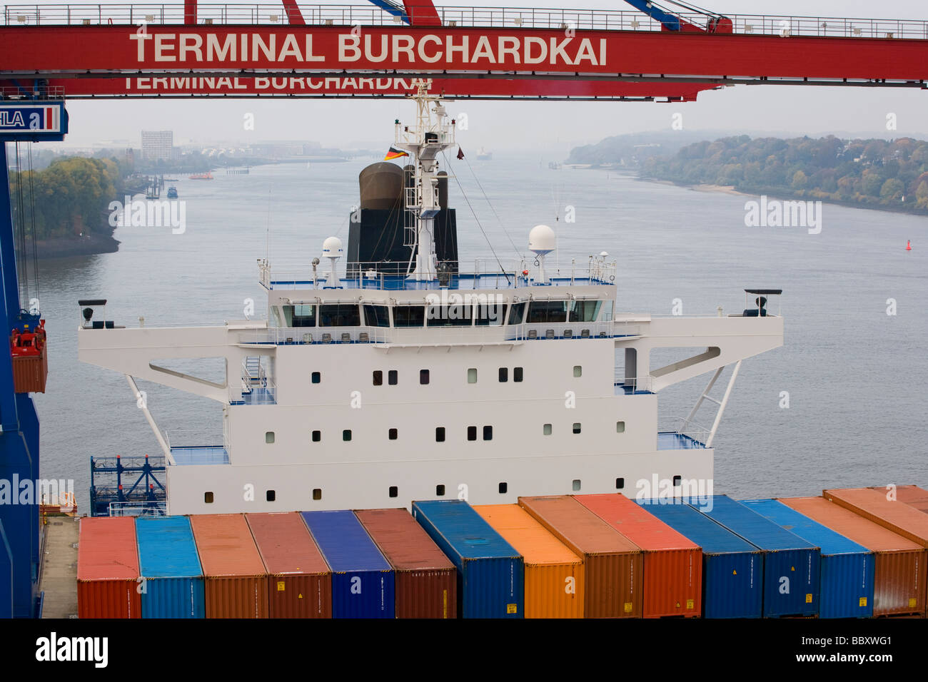 Container Onboard Containers onboard a docked containership await to be unloaded at ...