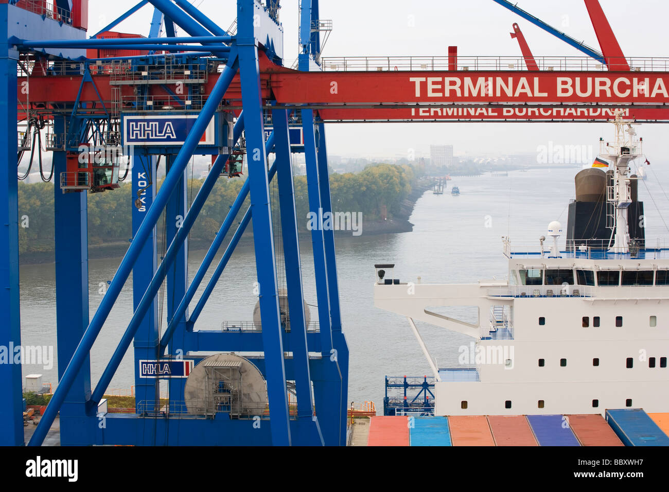 Container Onboard Containers onboard a docked containership await to be unloaded at ...