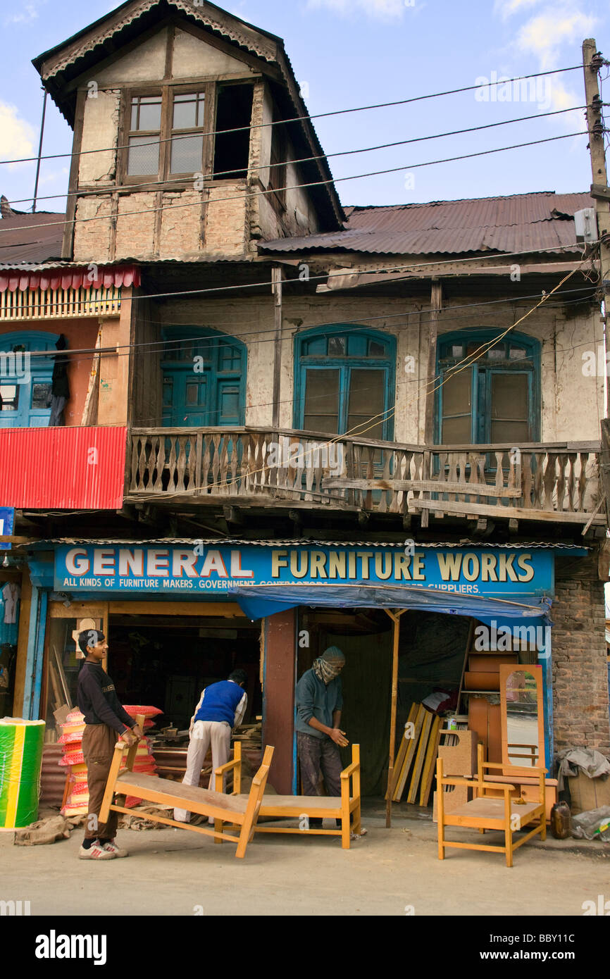 Traditional furniture craftsment outside their shop in Srinagar Stock