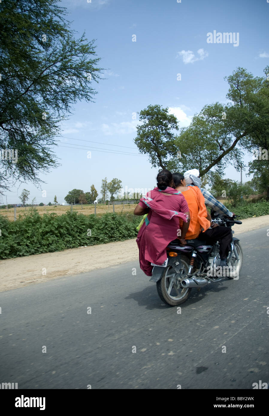 Stock photo of Typical rural transport, overloaded van with people,  Maharashtra, India. Available for sale on