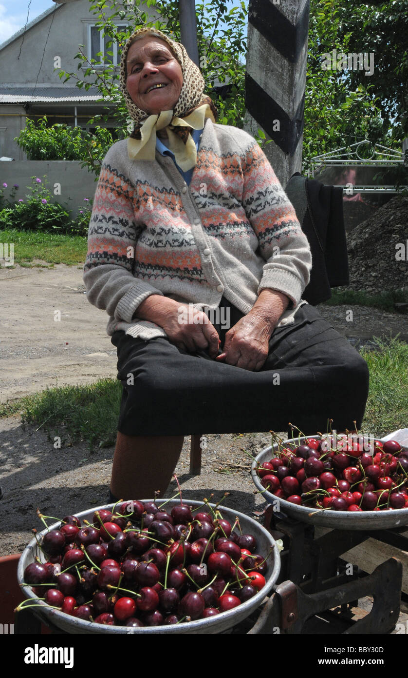 Old Woman Selling Cherries by roadside, Khmelnytskyi Oblast ...