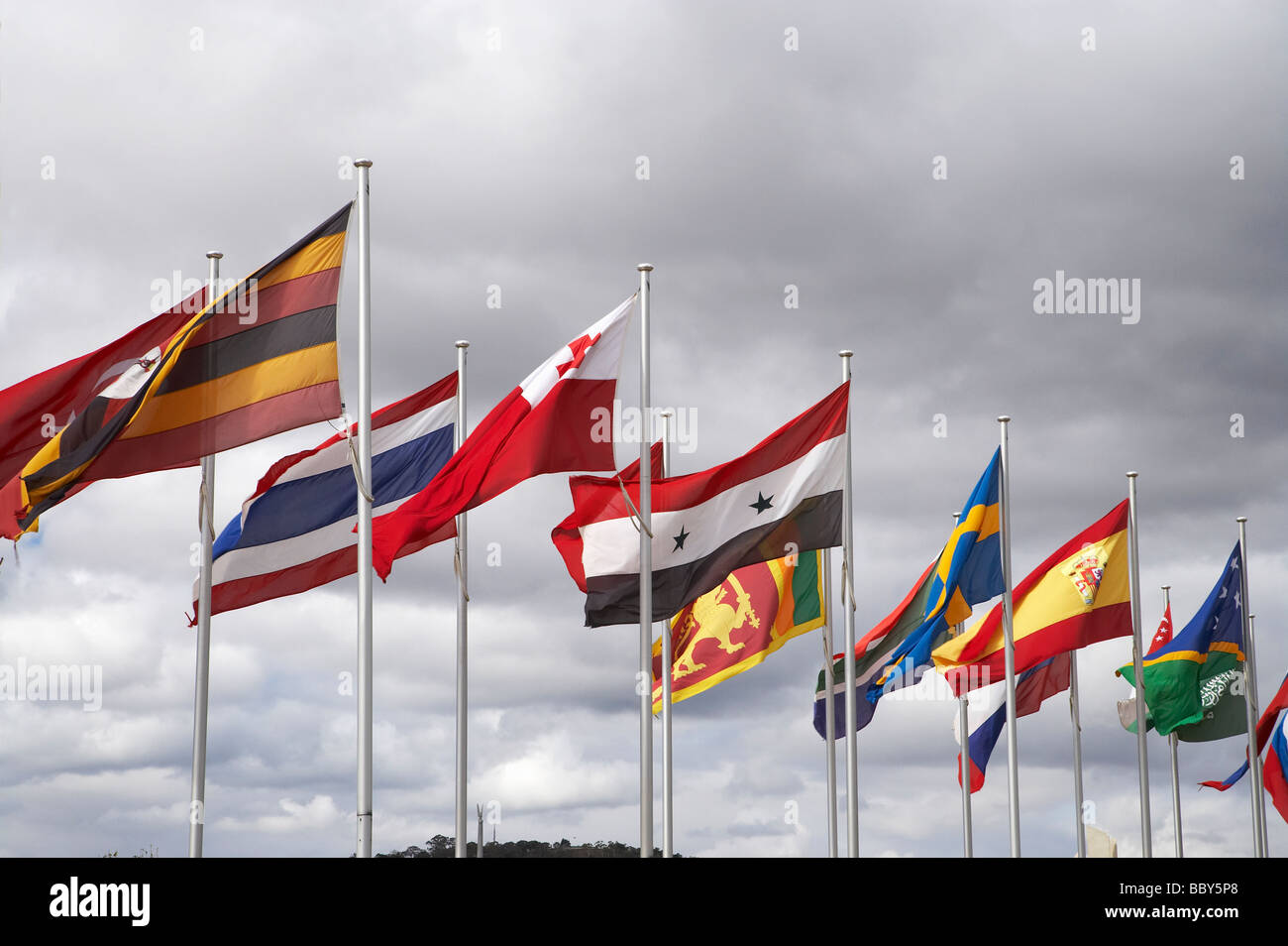 International Flags L to R Uganda Thailand Tonga Syria Sri Lanka Sweden Spain Solomon Is Commonwealth Place Canberra Australia Stock Photo