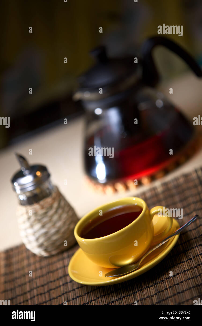 Yellow Table Tea Tea in yellow cup on table Stock Photo - Alamy