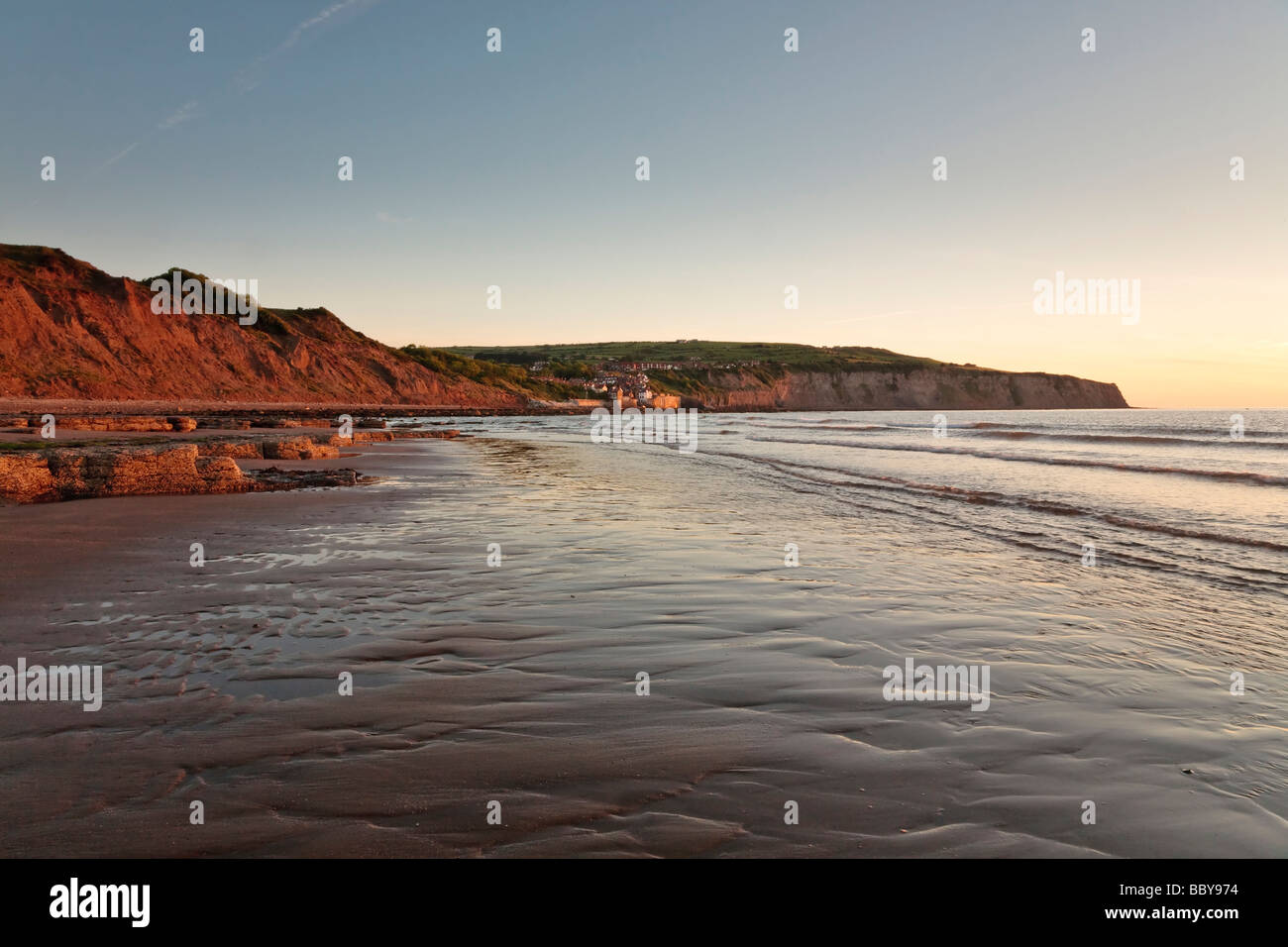 Sunrise at low tide Robin Hood's Bay, North Yorkshire, England, UK, Europe Stock Photo Alamy