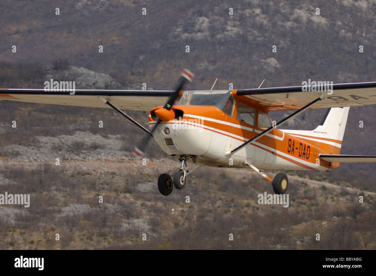 Small sport plane landing on airfield Grobnik near Rijeka, Croatia Europe Stock Photo