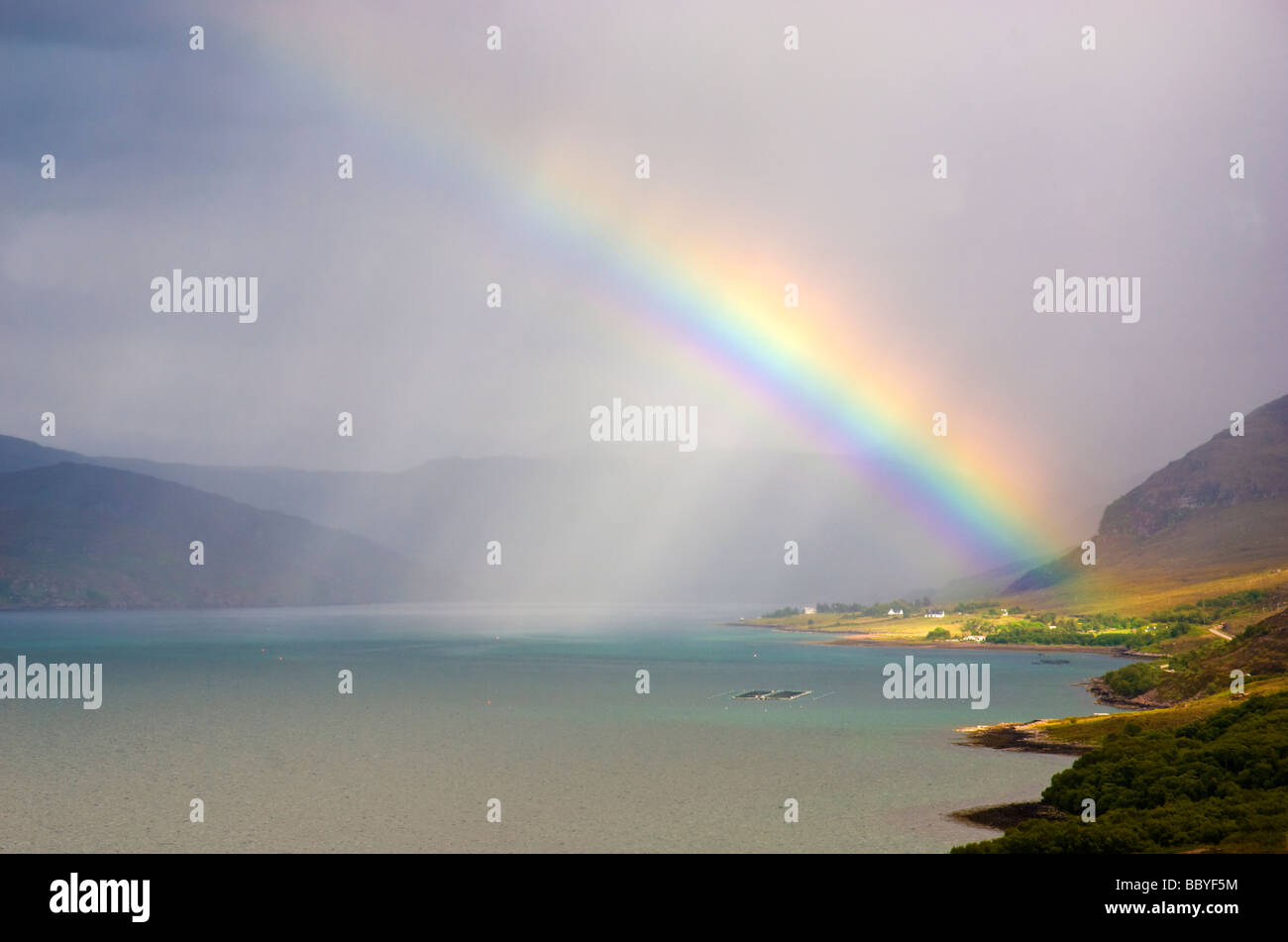 Rainbow lighting up Ardessie Scotland Stock Photo