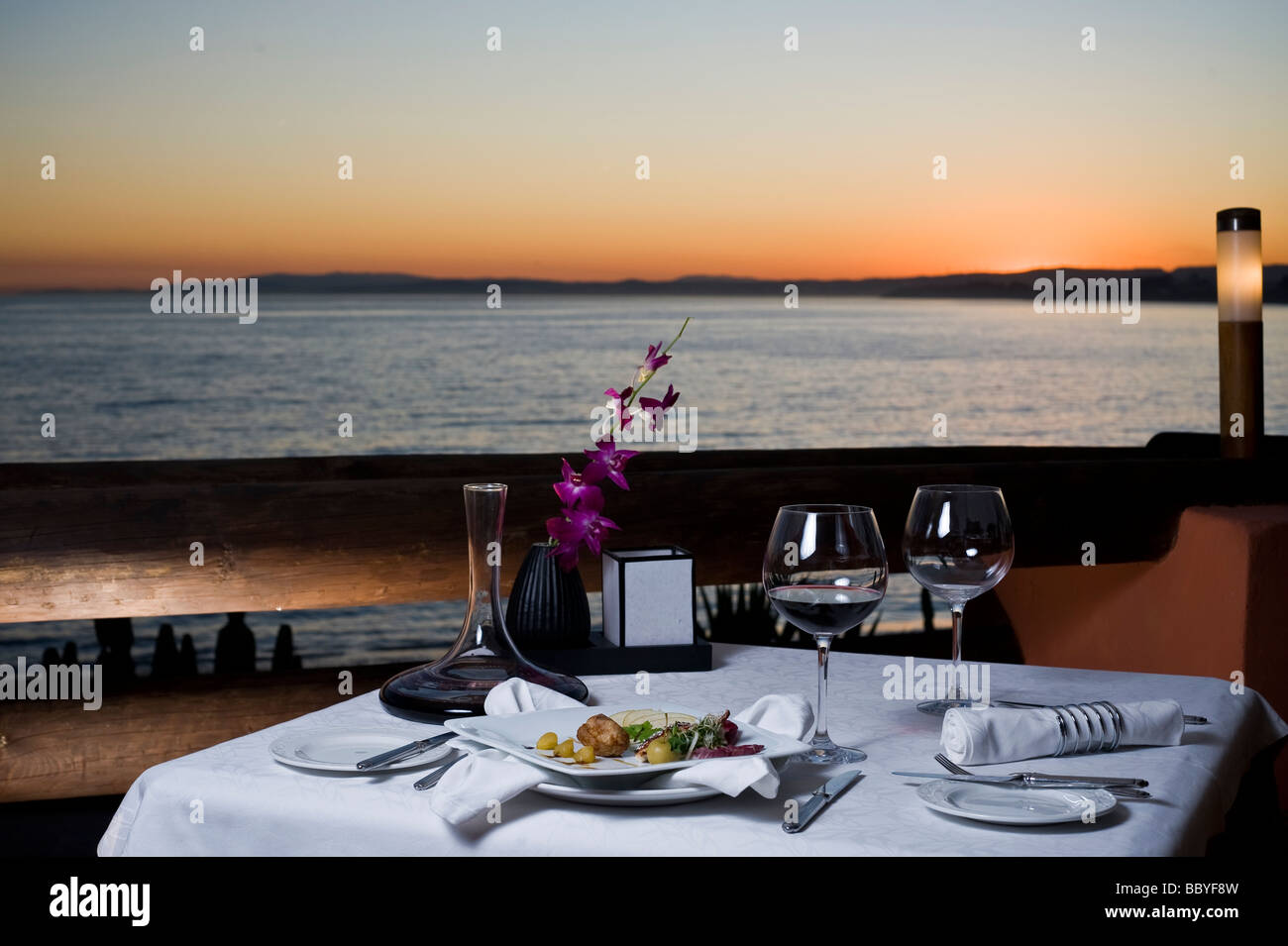 baby-chicken in a restaurant overlooking the mediterranean Stock Photo