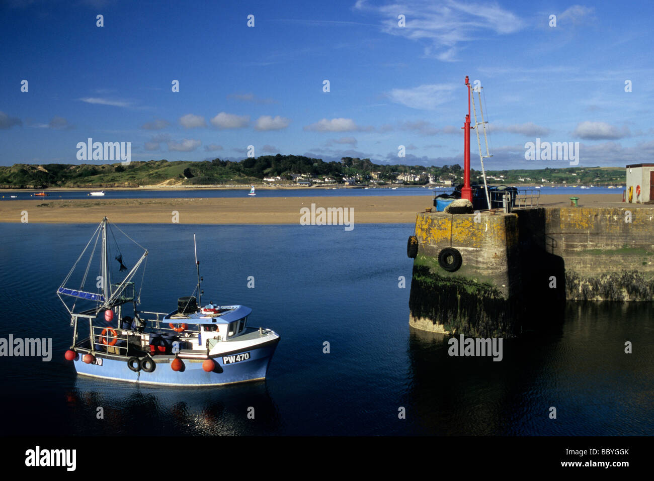 Fishing Boat arrives at Padstow Quay in Cornwall Stock Photo