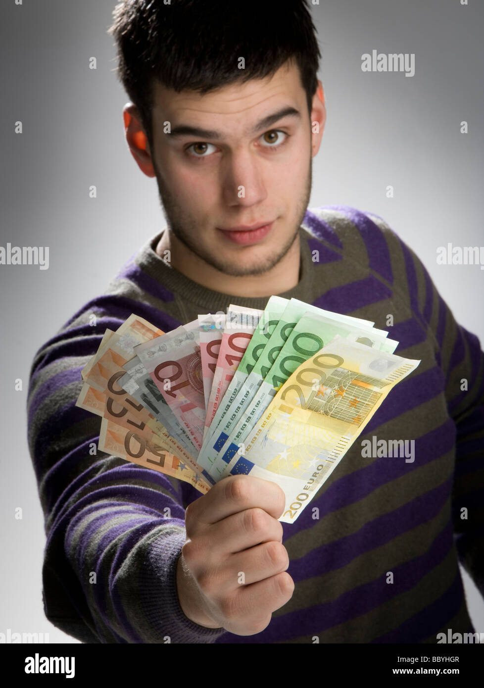 Happy businessman with bundle of euro money good business Stock Photo ...