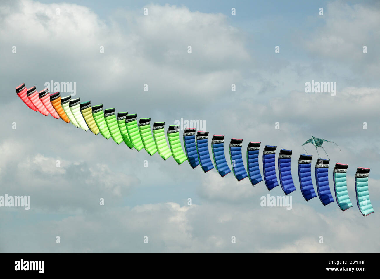 A gian stack of Flexifoil Kites being flown by one man during the