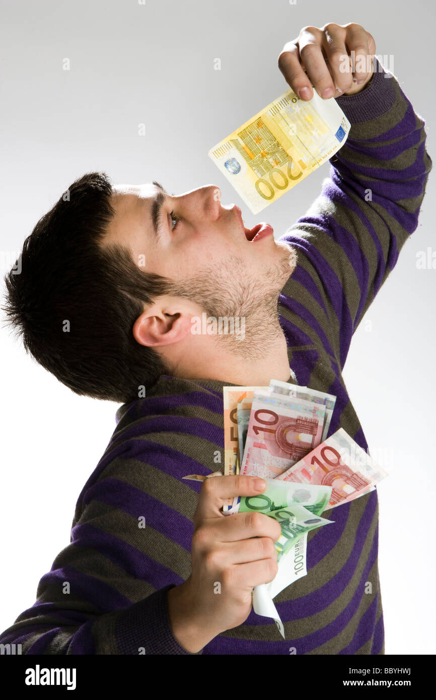 Happy businessman with bundle of euro money good business Stock Photo ...