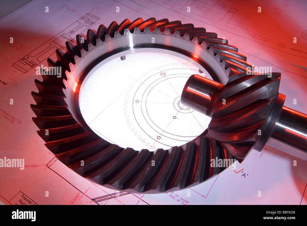 Final drive pinion and gear from a pre-war Rolls Royce photographed on an engineering drawing of the components Stock Photo