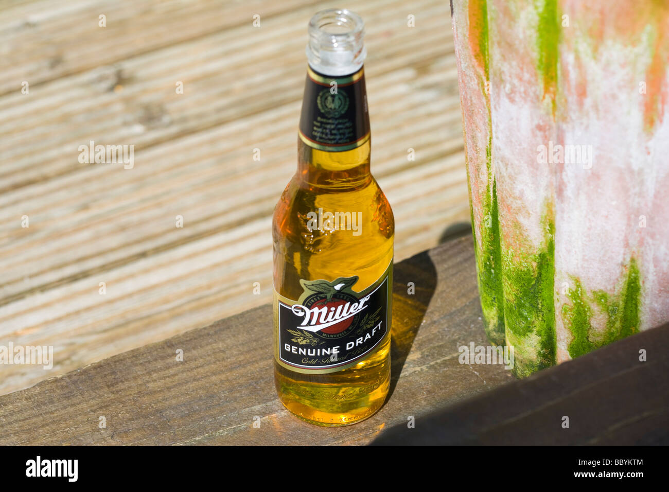 BOTTLE OFF BEER ON DECKING Stock Photo Alamy
