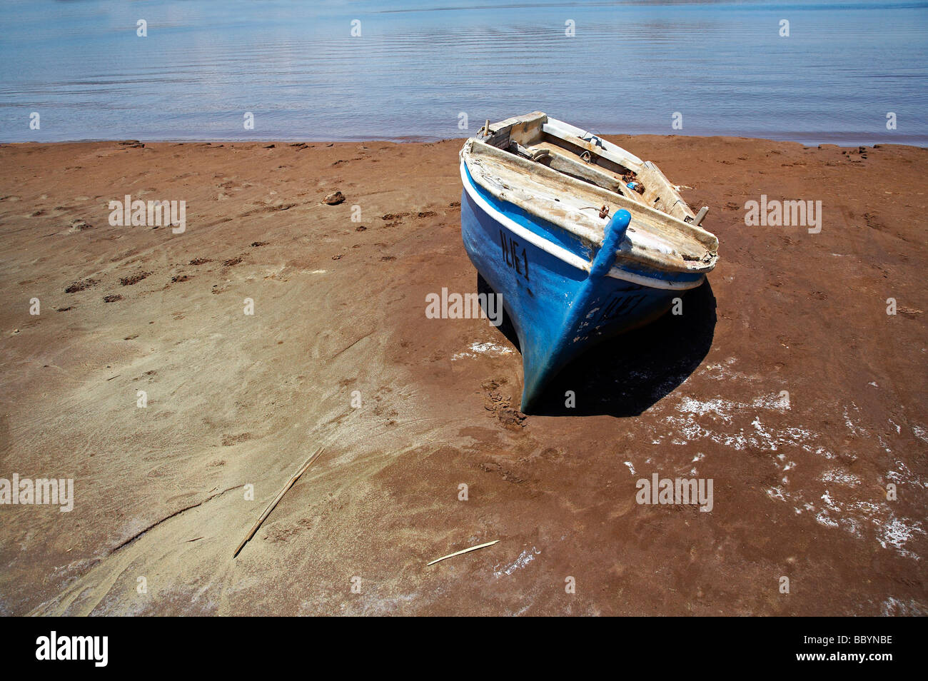 Old fishing boat on the beach Stock Photo - Alamy