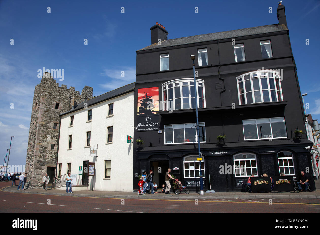 The old tower house housing bangor tourist information centre beside the black boat pub county down northern ireland uk Stock Photo