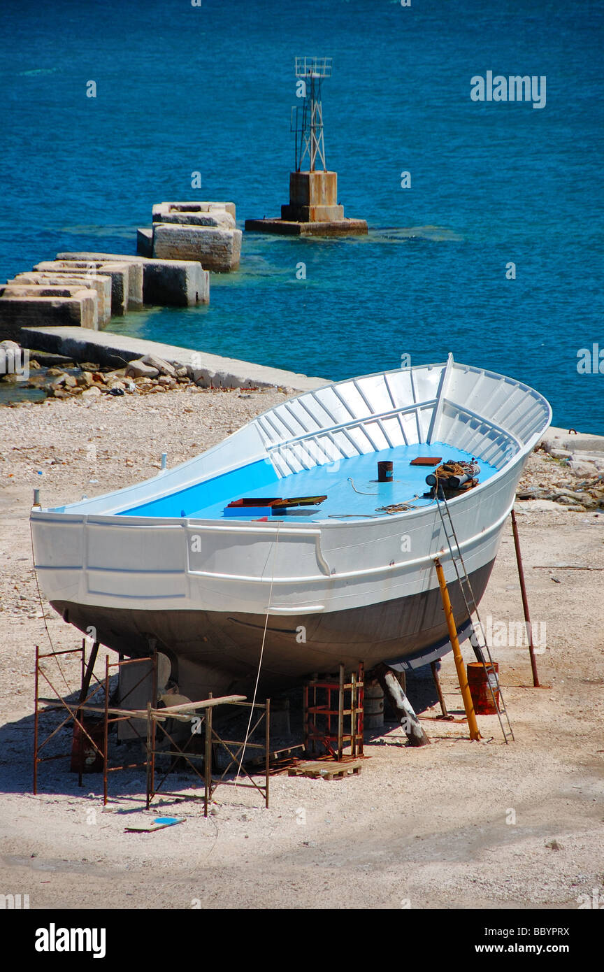 Fishing boat being repaired at a shipyard. Zakynthos, Greece. Stock Photo