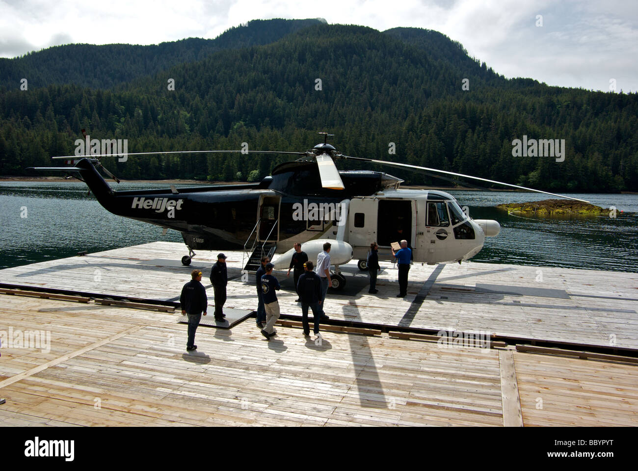 Crew at Haida Gwaii fishing resort unloading freight supplies cargo