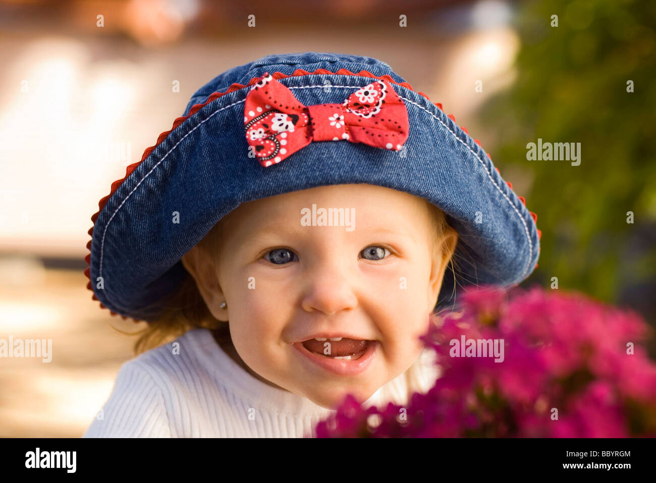 infant girl laughing Stock Photo