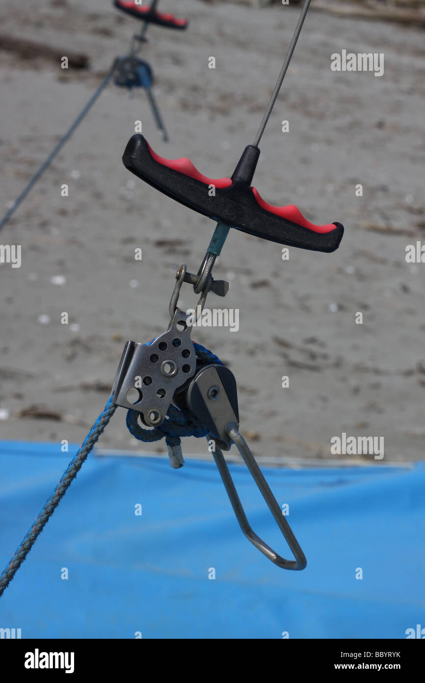 Hook of a trapeze of a sail boat on a beach Stock Photo