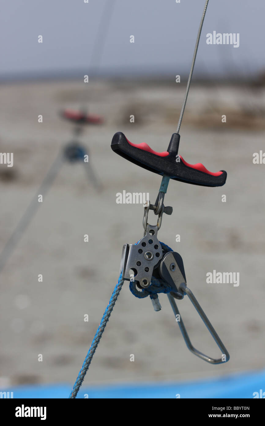 Hook of a trapeze of a sail boat on a beach Stock Photo Alamy