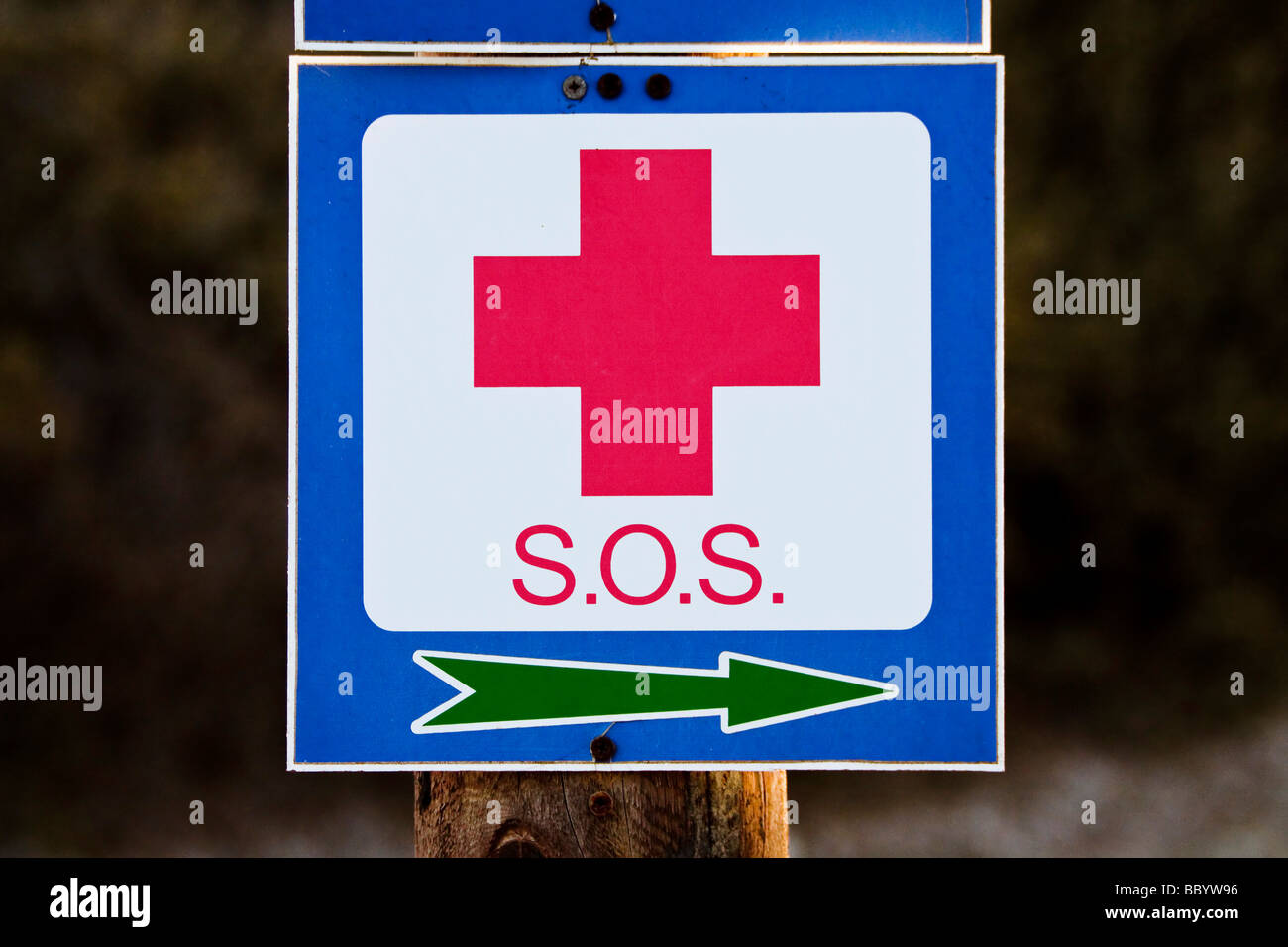 Direction sign to a First Aid Station Stock Photo