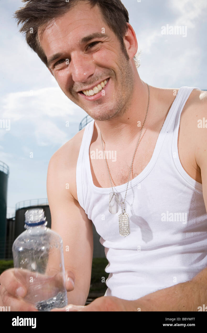 Young man smiling at the camera Stock Photo