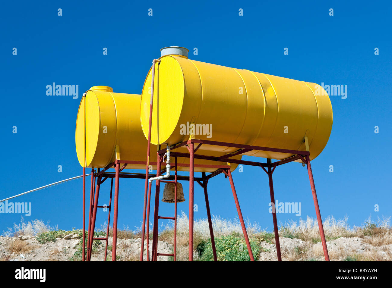 Two water tanks used for storage Stock Photo Alamy
