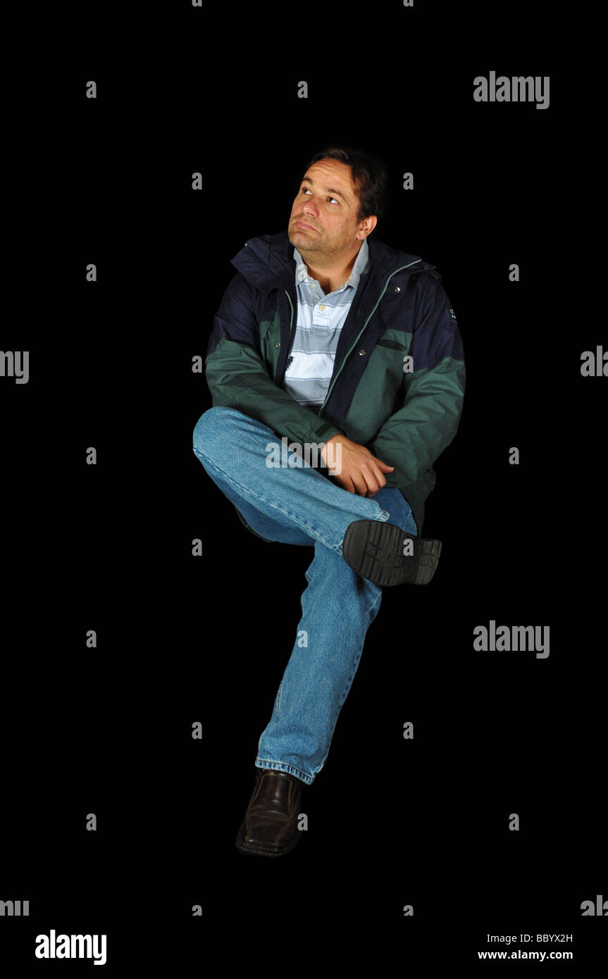 Lonely man sitting hi-res stock photography and images - Alamy