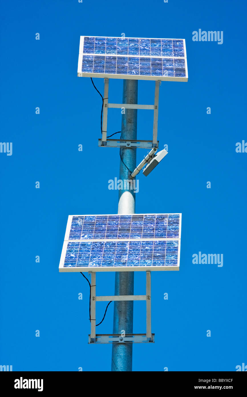 Solar panels mounted on post Stock Photo - Alamy