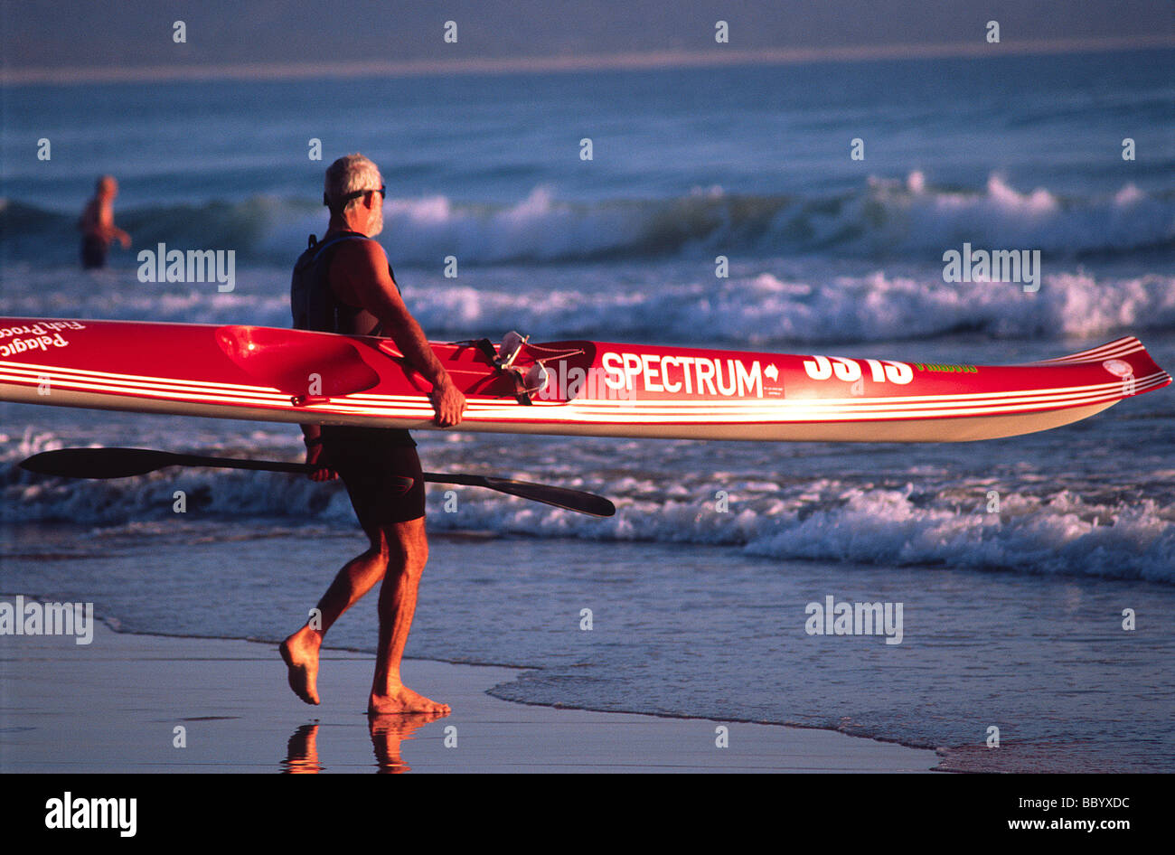 Sea kayak preparing to launch on Pambula beach, NSW, Australia Stock