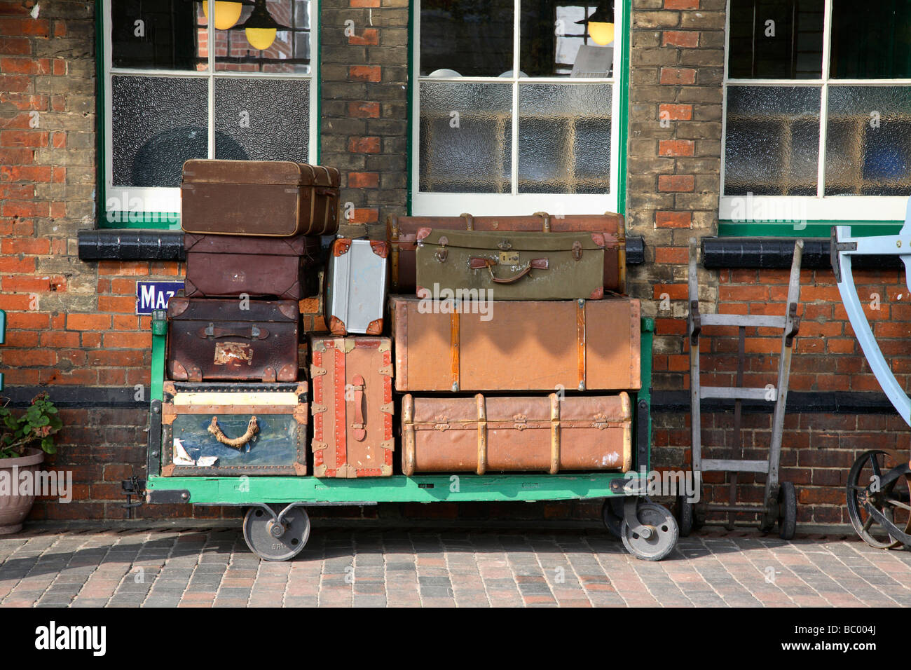 Old luggage on a railway platform. Stock Photo