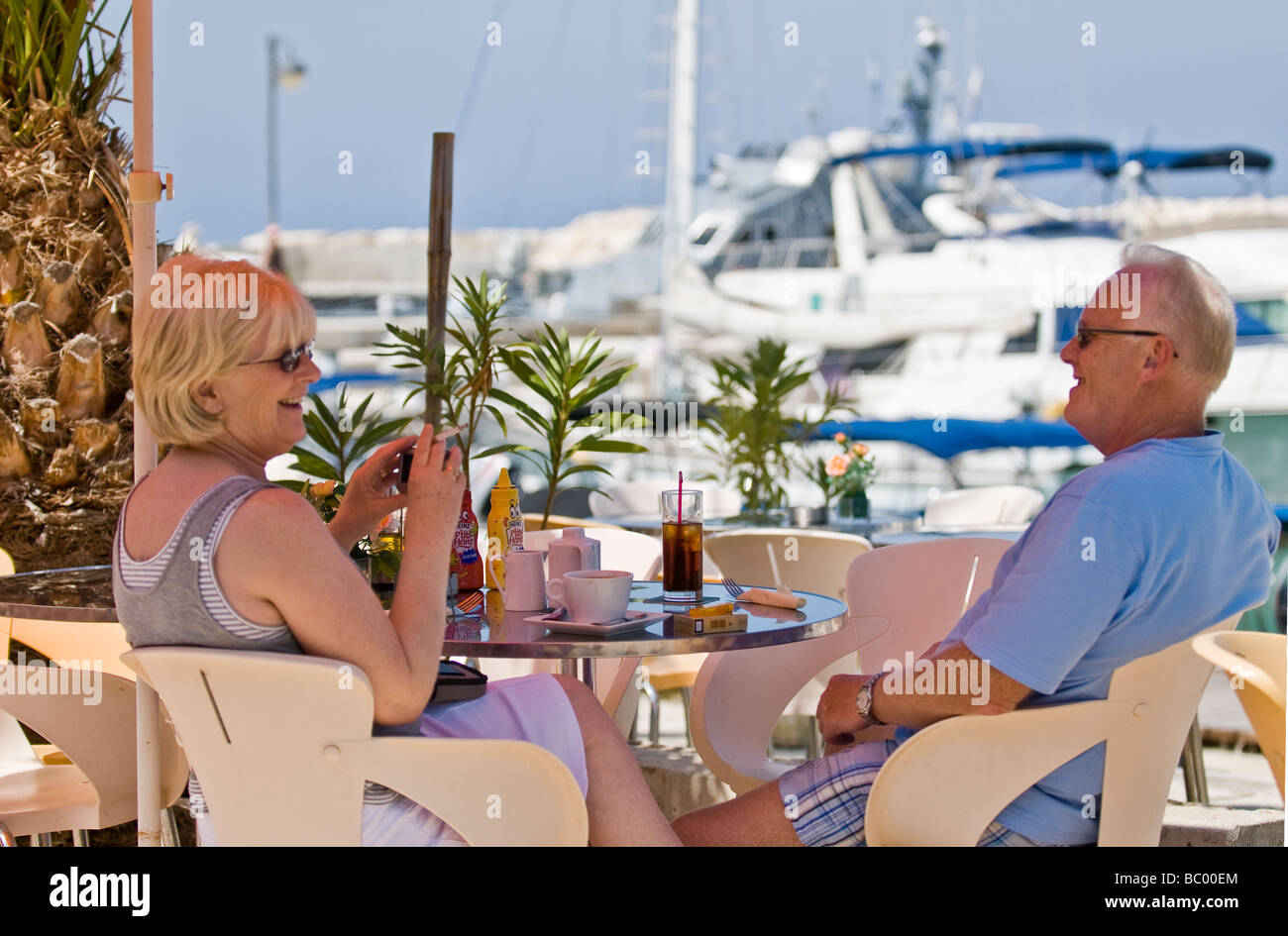 Relaxing on the pier, Pomos, Cyprus Stock Photo
