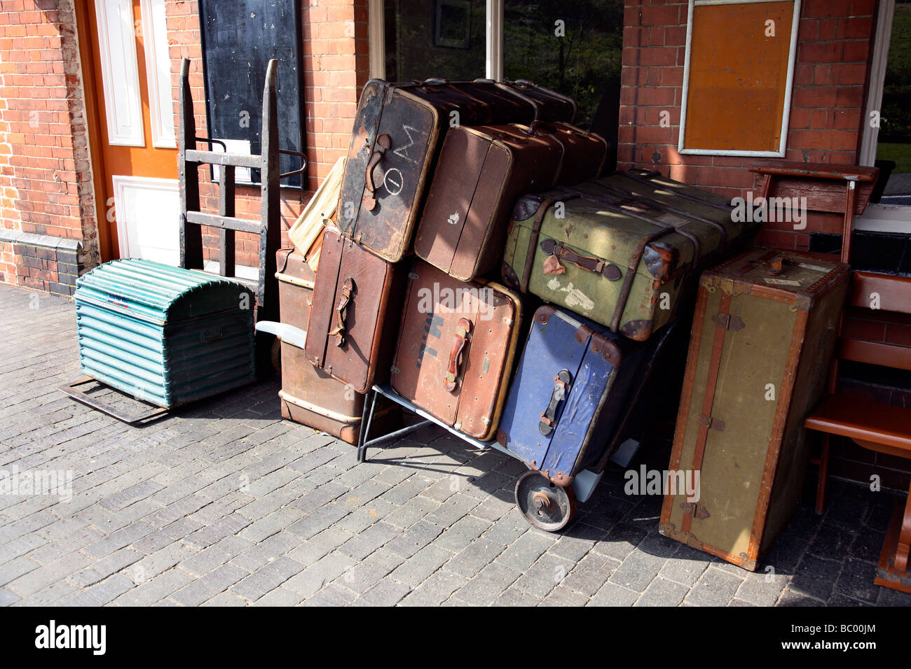 Old luggage on a railway platform. Stock Photo